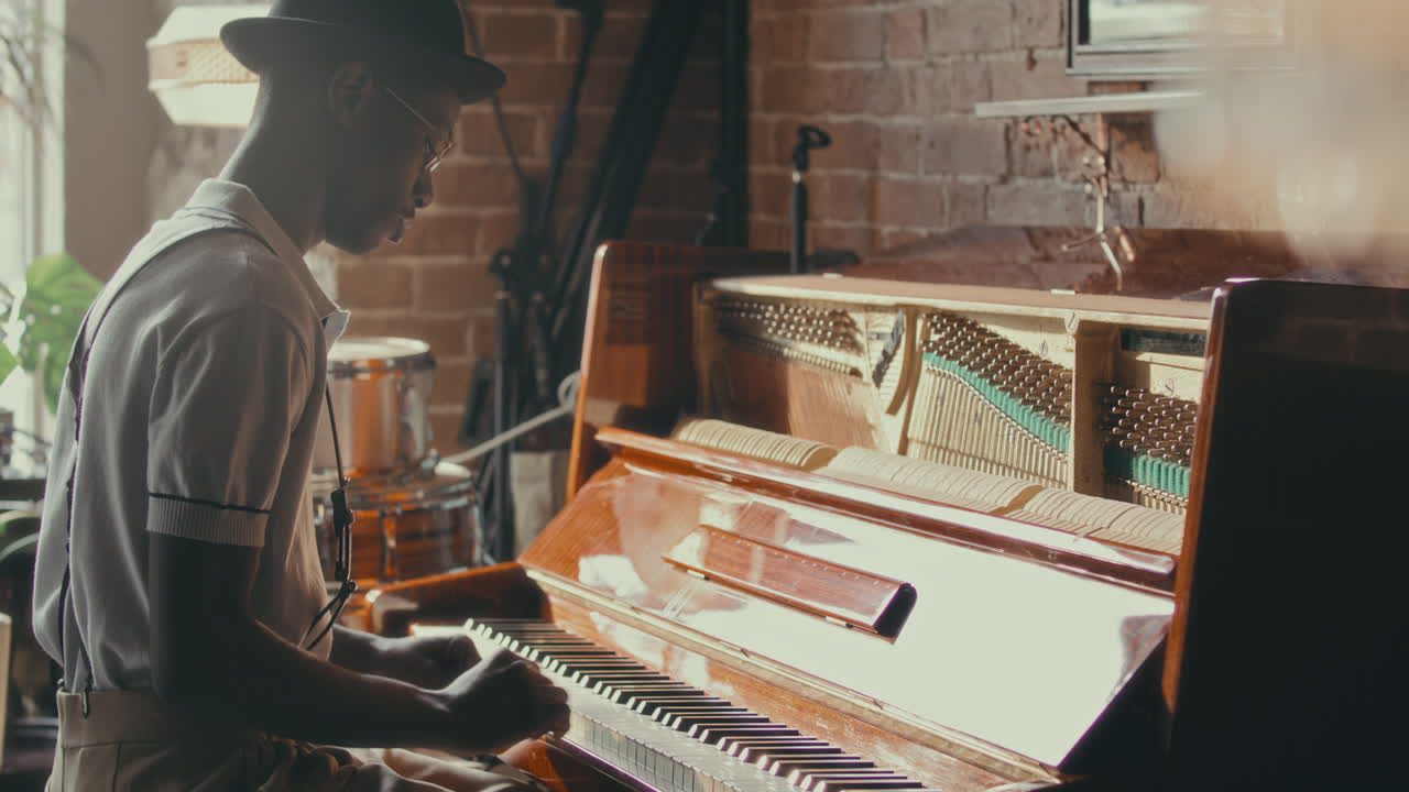 Man Playing Piano in a Cozy Interior