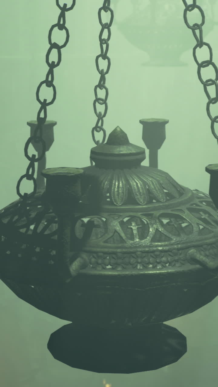 Intricate chandelier suspended in mysterious atmospheric lighting