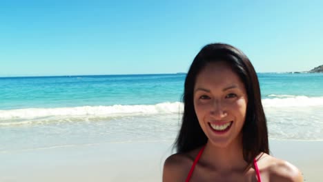 Woman-running-on-beach