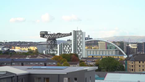 aerial wide static of glasgow's armadillo, finnieston crane and squinty bridge from afar