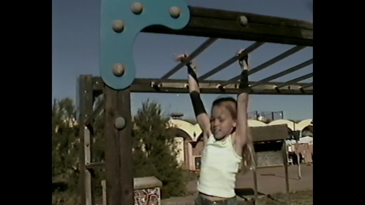Kids Playing on Monkey Bars