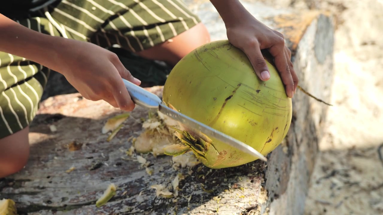 Preparing Young Coconut Drink During Relaxing Island Beach Adventure Escape