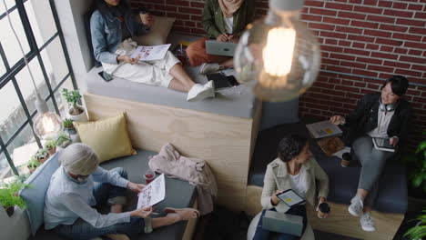 diverse business women brainstorming team discussing creative marketing strategy sharing ideas working on startup project together enjoying teamwork in relaxed modern office workplace top view