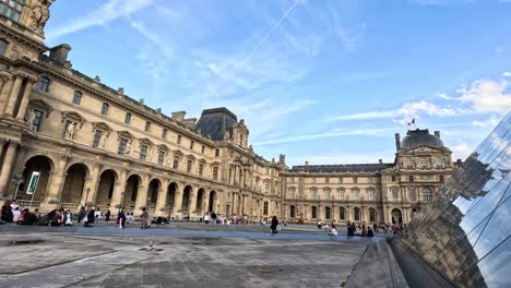 tourists at louvre museum in paris