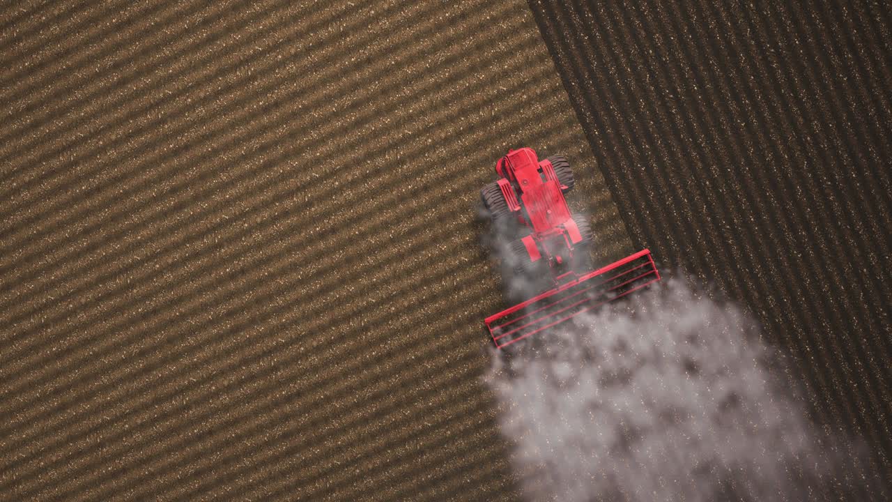 Shooting from drone flying over tractor with harrow system plowing ground on cultivated farm field, pillar of dust trails behind, preparing soil for planting new crop, agriculture concept, top 3d loop.
