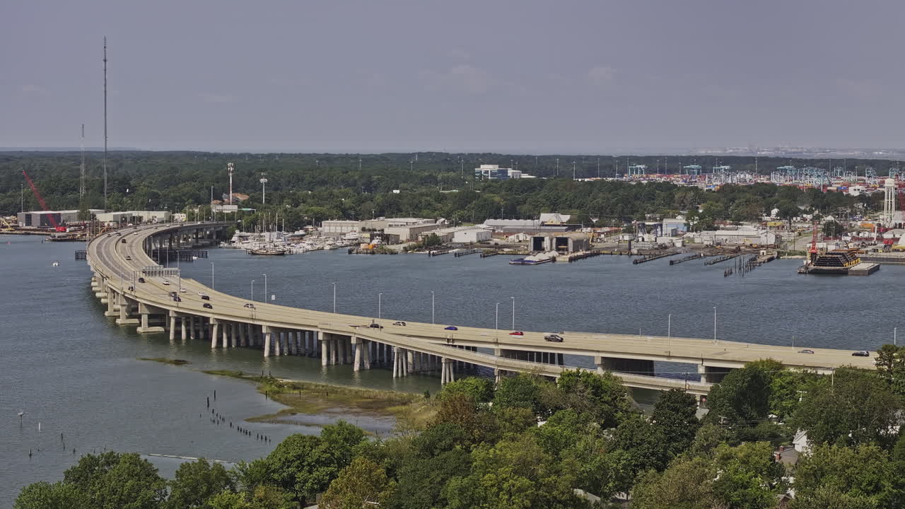 Portsmouth Virginia Aerial v5 flyover Port Norfolk capturing traffic on West Norfolk Bridge spanning Elizabeth River, with views of industrial waterfront - Shot with Mavic 3 Pro Cine - Sept 30th 2023