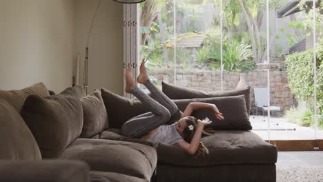 girl playing on the sofa