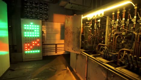 industrial control panel with green and red lights