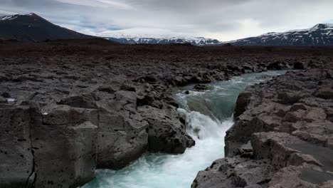 Flowing-river-between-basalt-rocks-on-Iceland