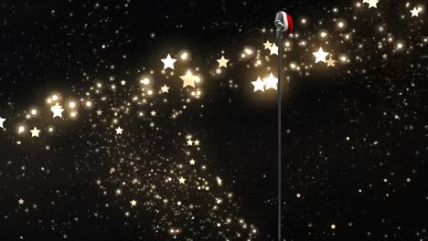 Weihnachtsmütze-über-Mikrofon-Vor-Goldener-Sternschnuppe-Vor-Schwarzem-Hintergrund