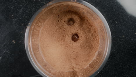 mixing chocolate powder and truffles