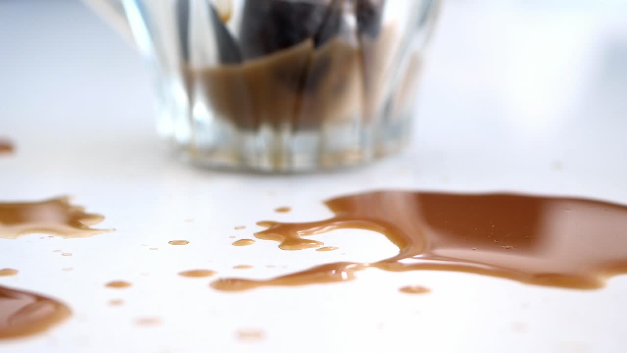 Coffee Spill on White Surface