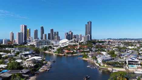 aerial animation of a cityscape with canals, showcasing modern architecture and vibrant urban life under clear blue skies