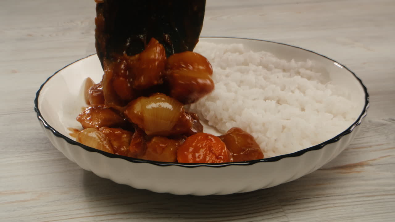 Japanese curry rice with fry pork Tonkatsu, Katsu Kare, Japanese breaded cooking dinner in restaurant, close up macro of asian food