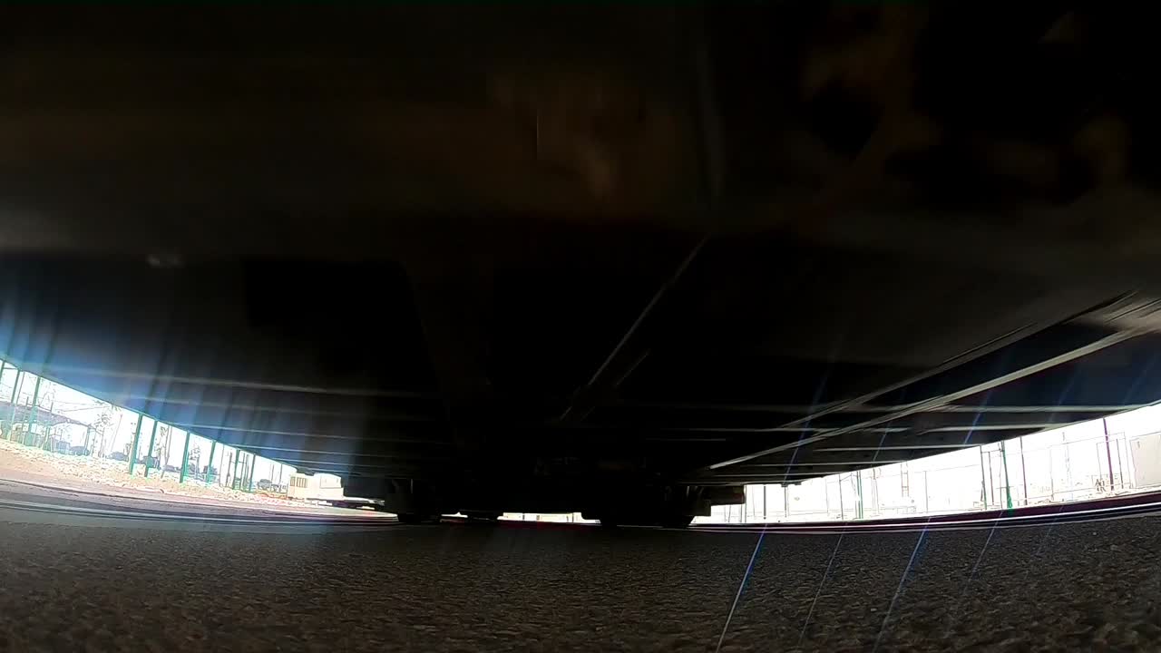 Train Undercarriage and Construction Site