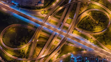 4k time lapse or hyper lapse zoom out : aerial view network or intersection of highway road for transportation or distribution concept background.