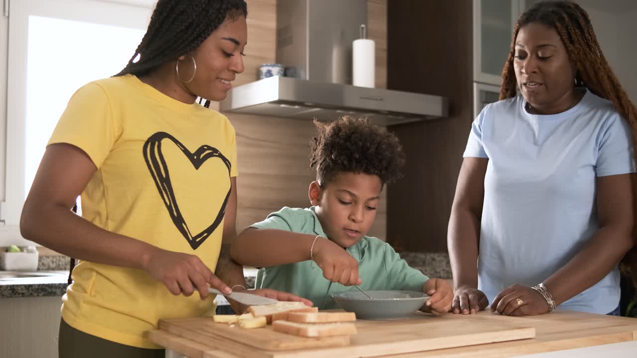 Family bonding while preparing food in the kitchen