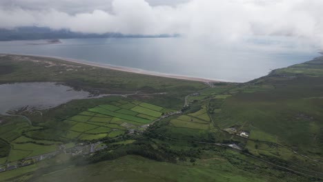 drone reveal view though clouds inch beach dingle southwest atlantic coast, ireland