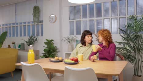 two women enjoying breakfast together