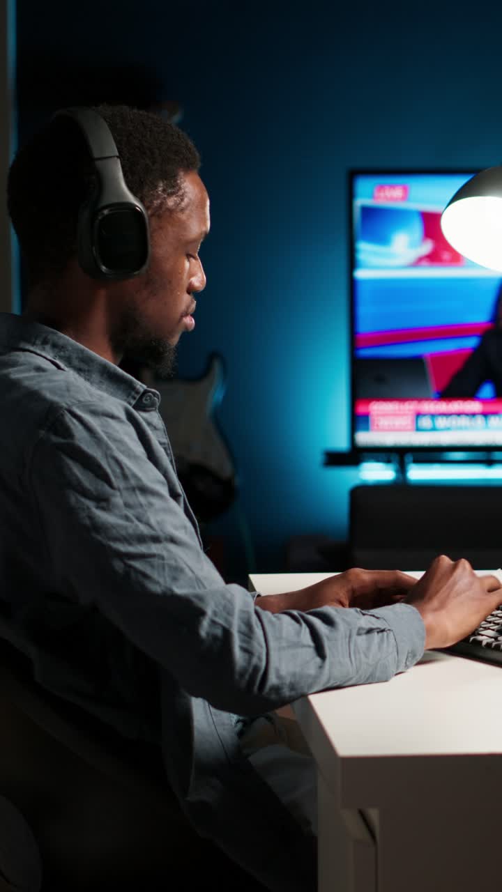 Man working on computer at desk