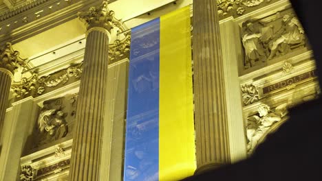 National-Flag-of-Ukraine-on-Museum-Building-in-Downtown-Prague,-Support-for-Ukrainian-People-After-Russian-Invasion-and-Military-Actions