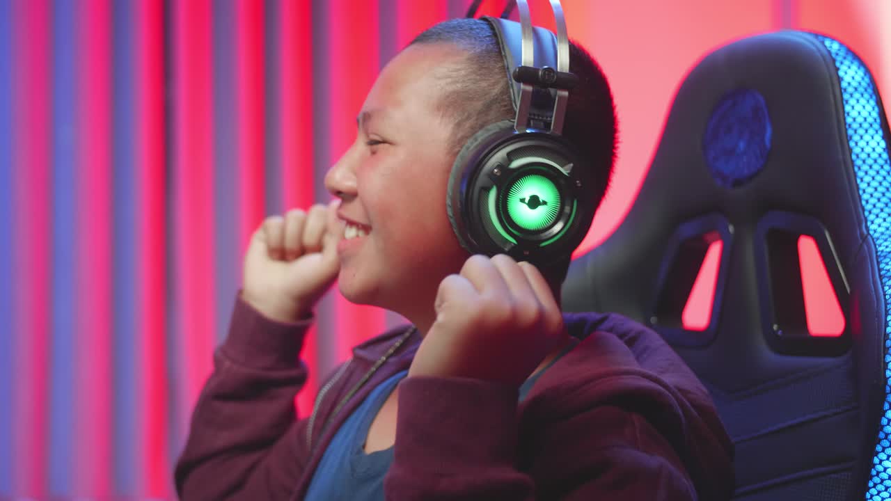 Excited Teen Gamer Celebrating Victory