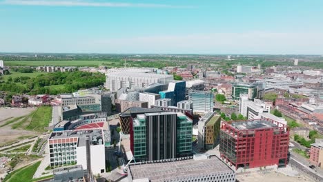 former factories converted into state-of-the-art buildings including a cinema in newcastle's leazes area with in the background the football stadium st james park on a sunny day