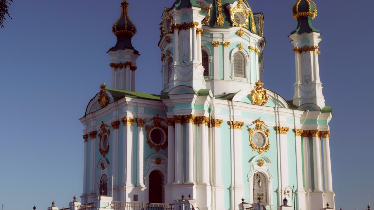 Slow, telephoto tilt down the exterior of St Andrews Church Kiev with stunning morning light