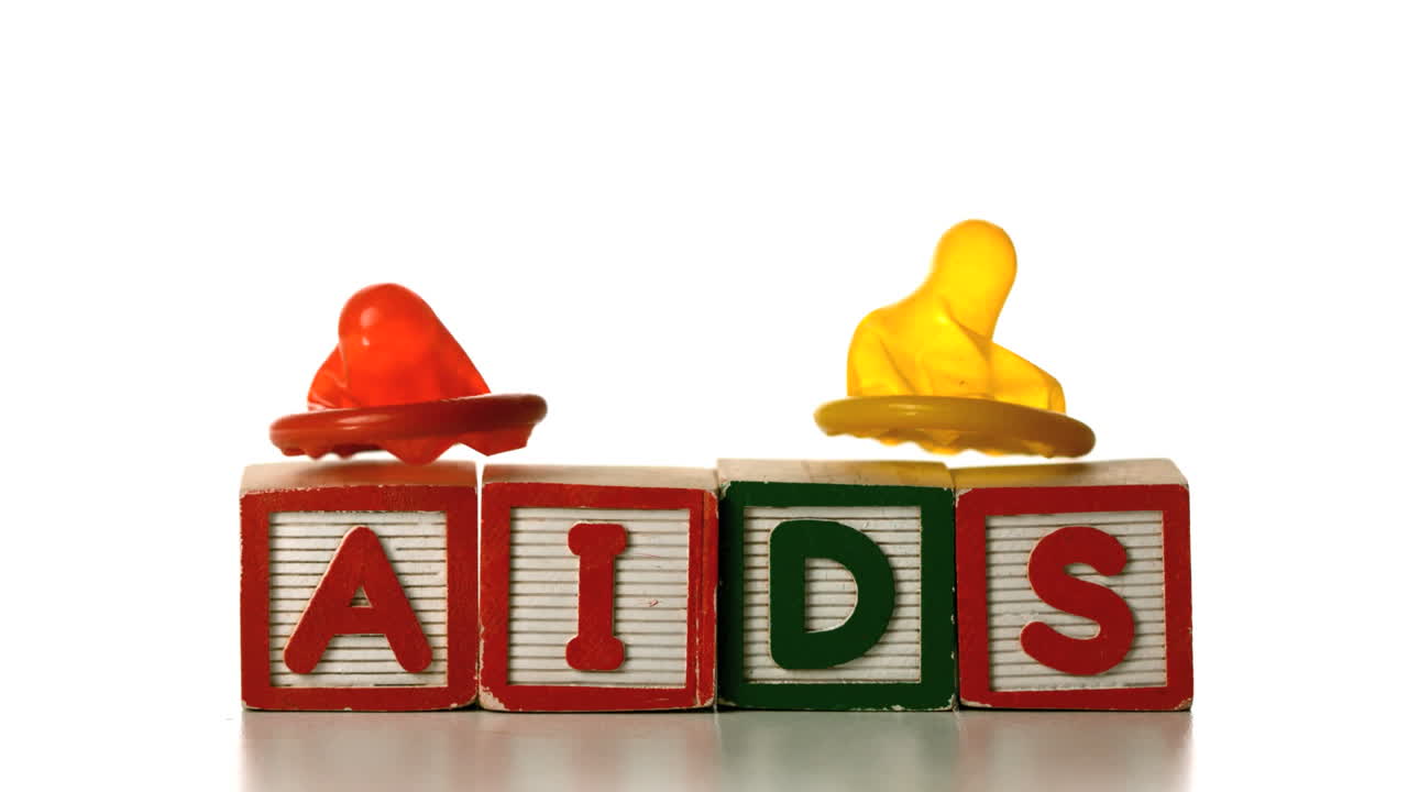 preservativi che cadono su blocchi di ausili ortografici