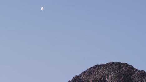 Video-of-beautiful-view-of-top-of-rock-and-moon