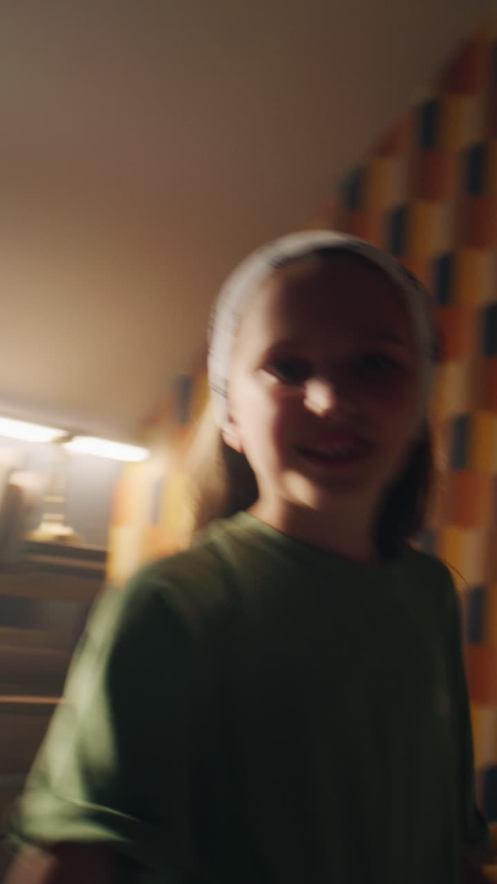 Young Girl Dancing and Singing against White Background Young Girl Dancing and Singing against White Background