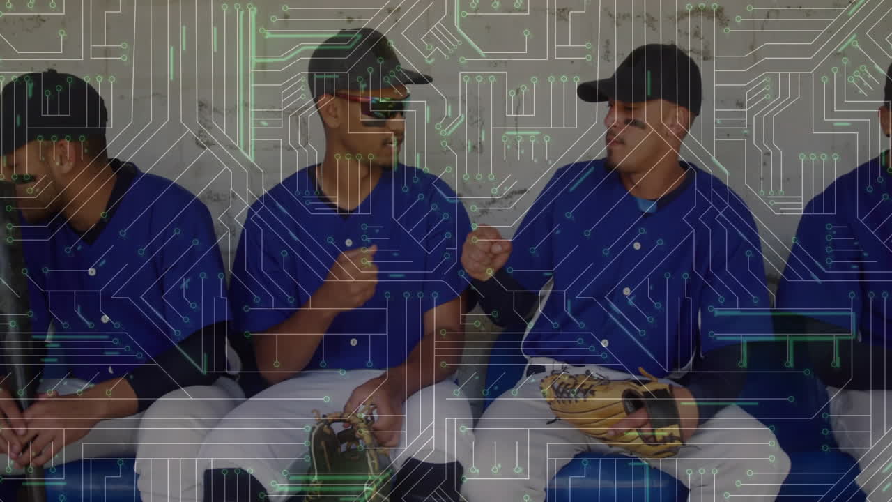 Baseball players sitting on bench with circuit board animation overlay