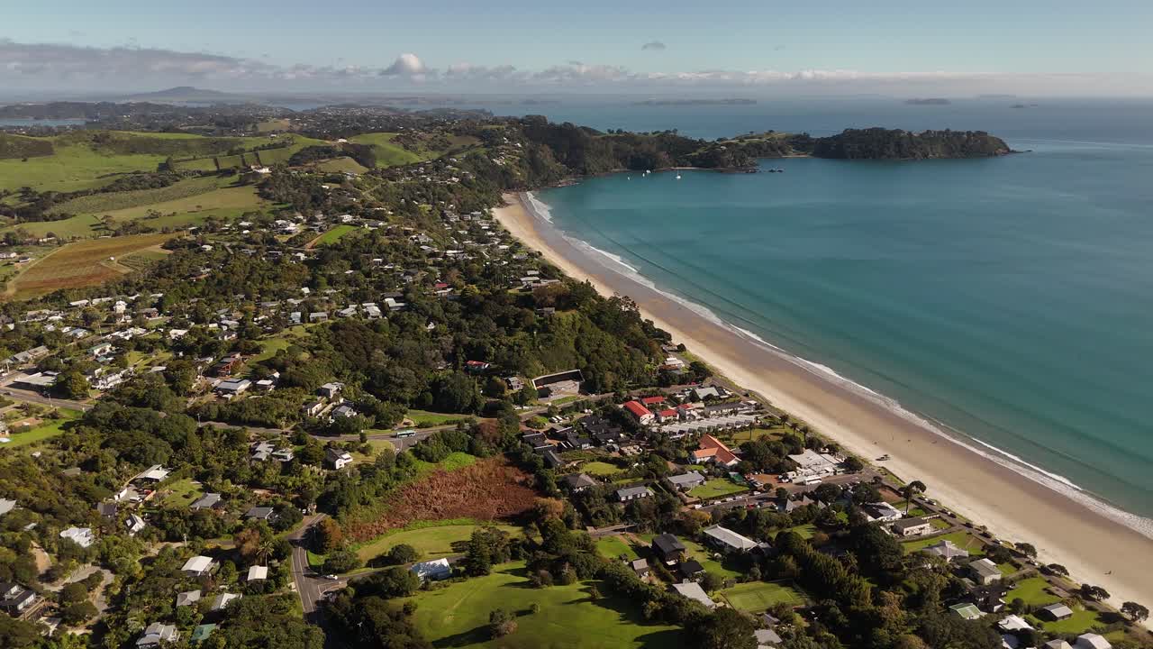 Onetangi Beach and the residential area at the oceanfront.