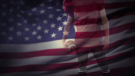 male rugby player against waving us flag