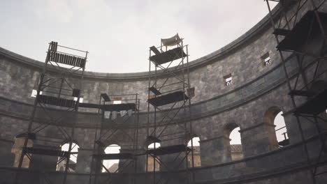 abandoned roman colosseum with scaffolding