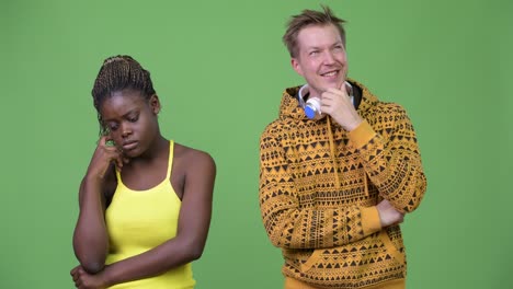 young multi-ethnic couple thinking together