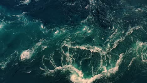 waves of water of the river and the sea meet each other during high tide and low tide.