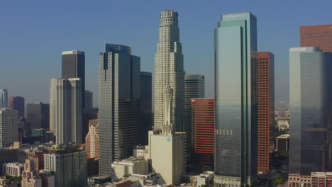 Downtown-Los-Angeles-Skyline-with-view-of-US-Bank-iconic-Skyscraper-Tower,-Aerial-drone-perspective-wide-shot,-circa-2018