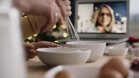 Close-up-video-of-family-having-video-conference-while-baking
