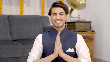 indian man praying on diwali