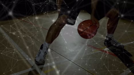 animation of networks of connections over mixed race male basketball player at gym