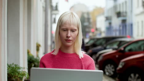 happy woman using laptop