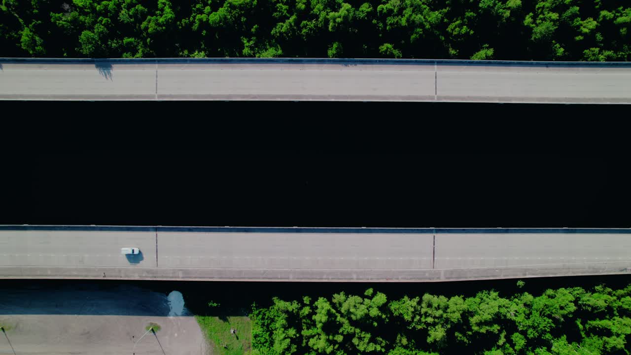 Dynamic top-down drone view of I-55 twin highways near LaPlace, Louisiana—ideal for transport logistics and infrastructure B-roll.