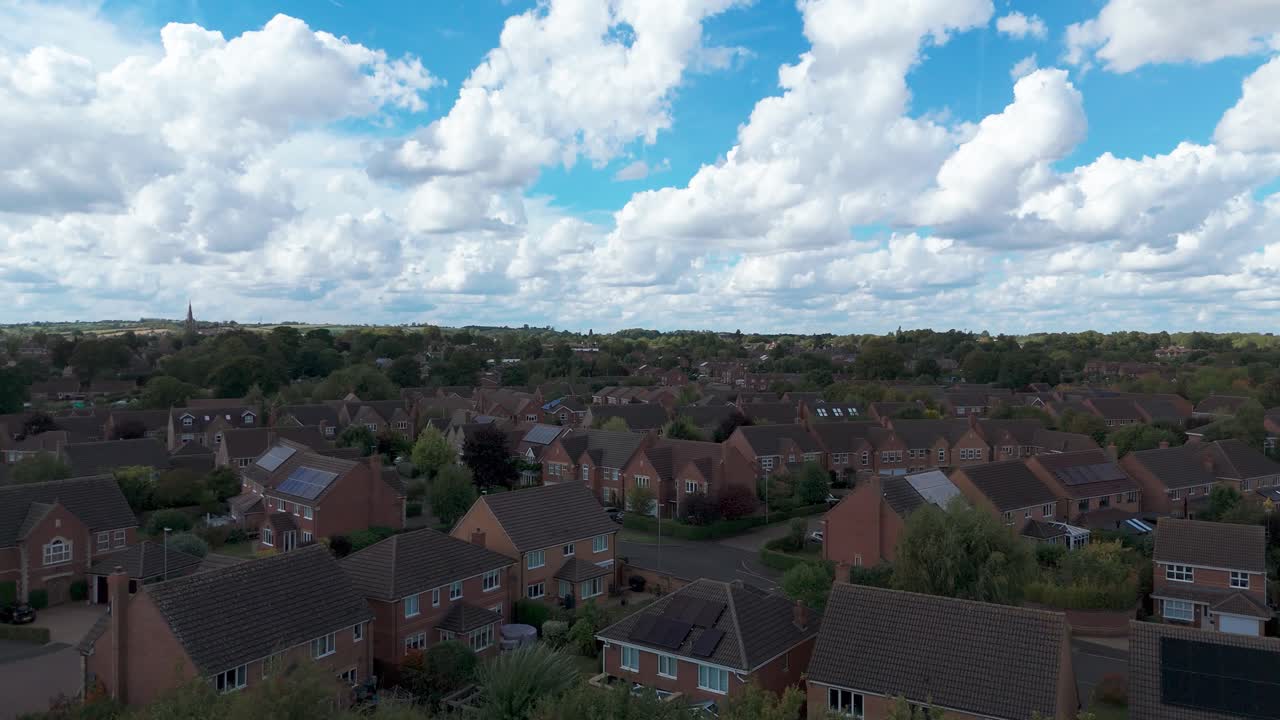 Scenic aerial view of Oakham Rutland houses beneath a cloudy sky