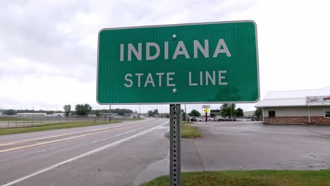 indiana state line sign on the state line with michigan with gimbal video tilting up