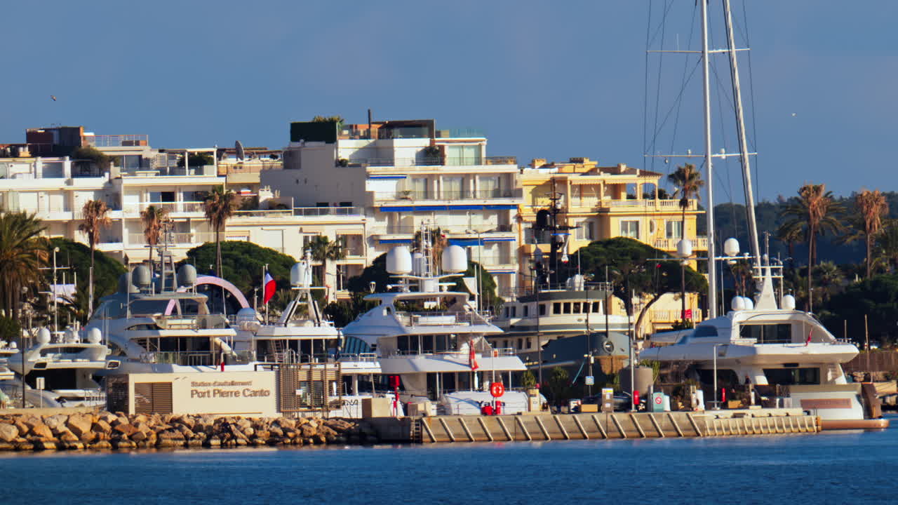 Cannes, France - March 3, 2025: Boats docked in the Cannes Marina