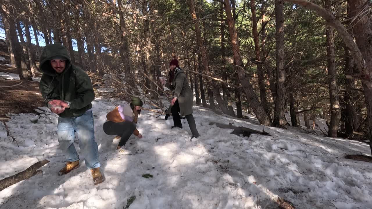 Snowball fight in the forest