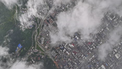 bogota colombia aerial v10 high altitude top down view, drone flyover la paz, hillside germania and santa fe capturing the neighborhoods above the clouds - shot with mavic 3 cine - november 2022