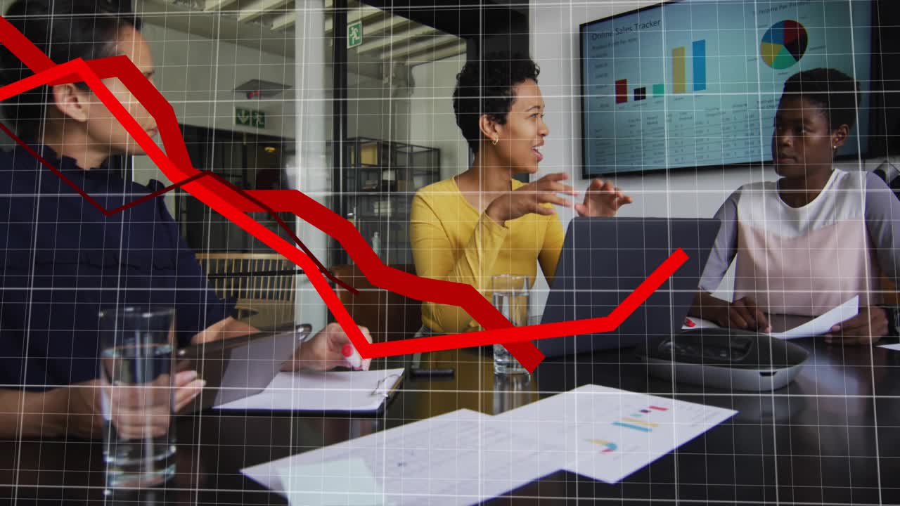 Center speaker gesturing starting grid overlay and red line tracing finance dip to rise team noting