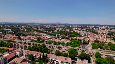 aerial establishing shot of the saint clement aqueduct in montpellier